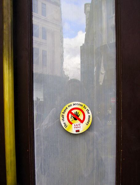 sticker on door: the staff have no access to the money