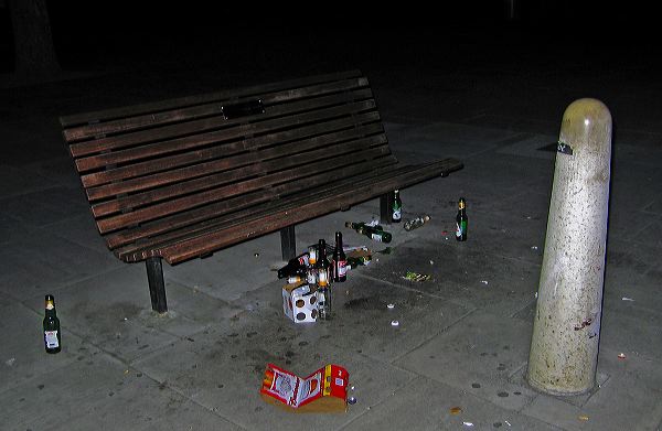 park bench with beer bottles